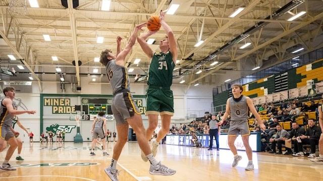 Andrew Young goes to the basket in DII men's basketball.